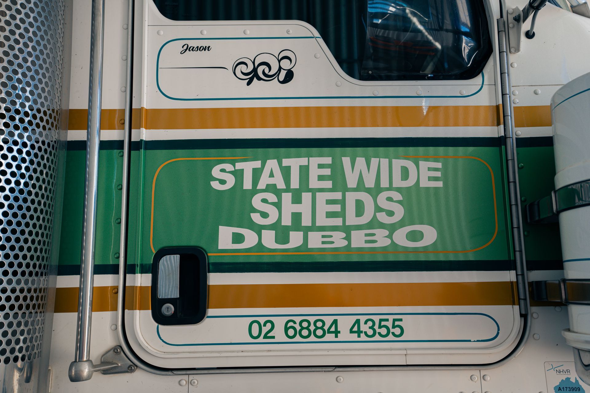 The side of a truck that says state wide sheds dubbo