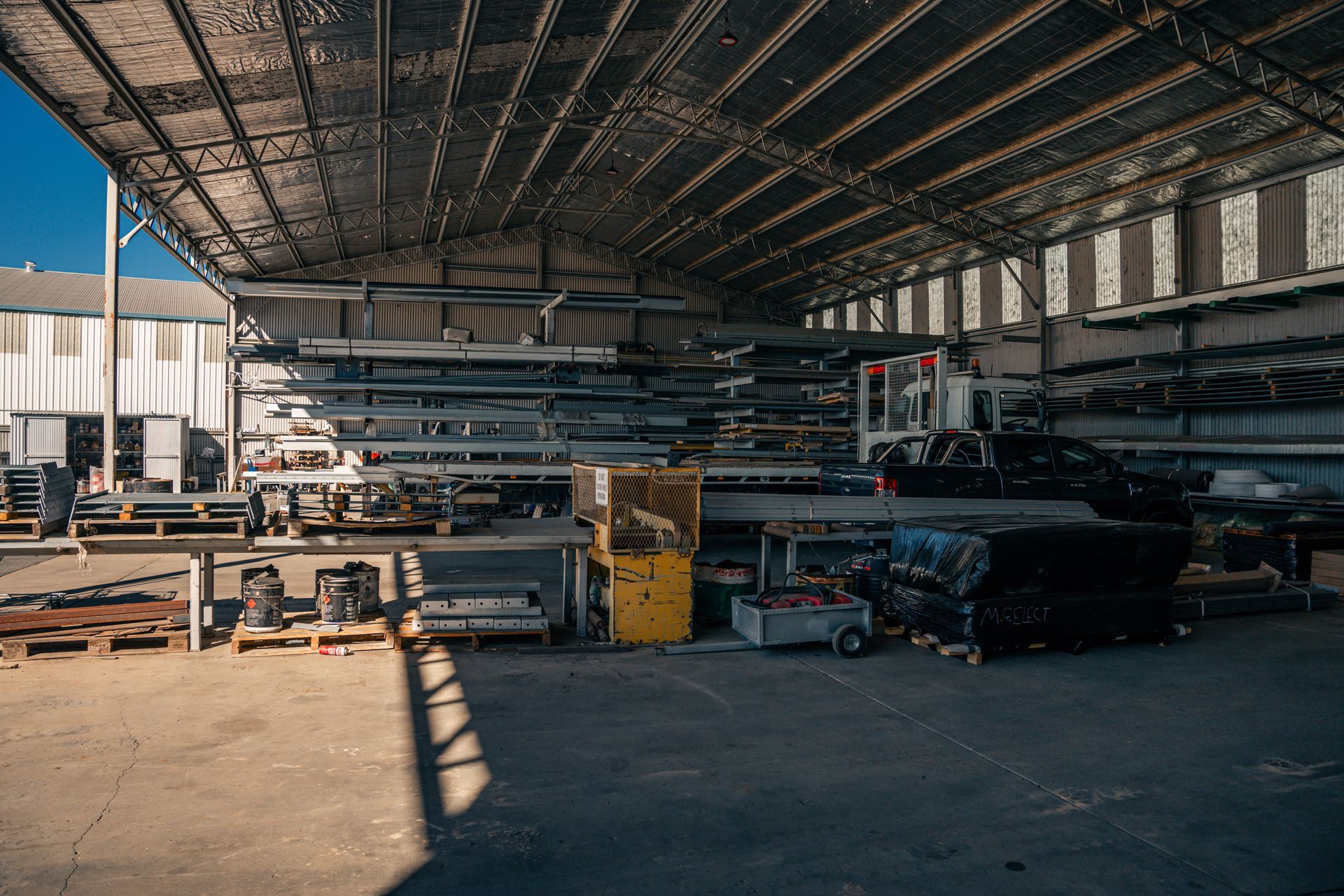 A large warehouse filled with lots of metal.
