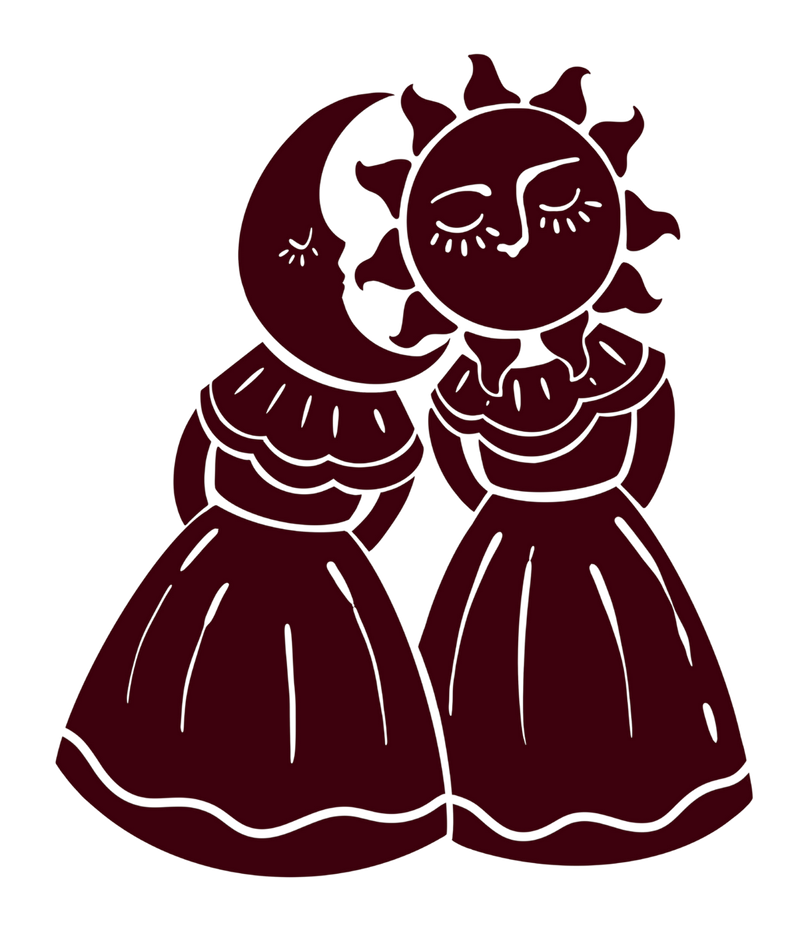 A couple of women standing next to each other with a sun and a crescent moon on their heads.