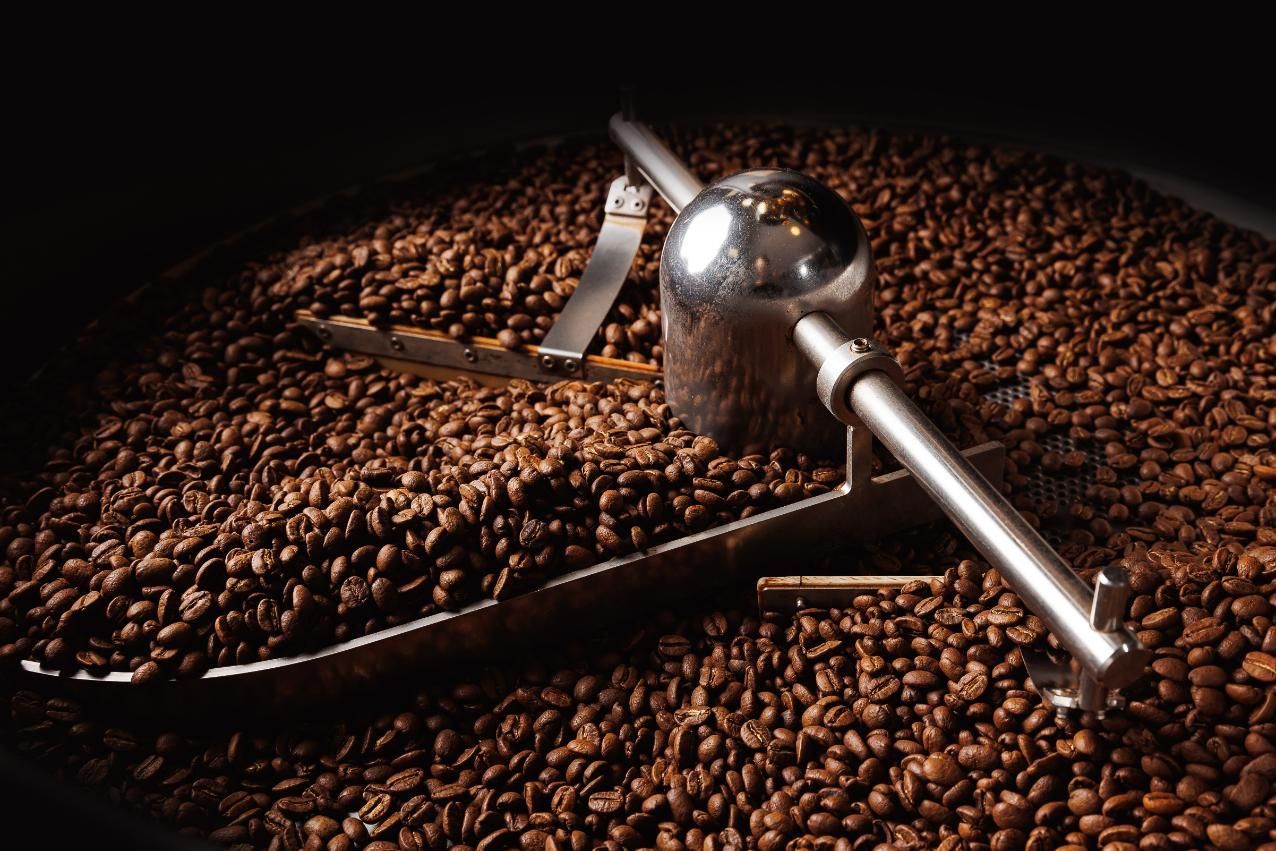 Coffee Beans Are Being Roasted in a Machine — Labroco Gourmet Coffee Supplier In Tea Gardens, NSW