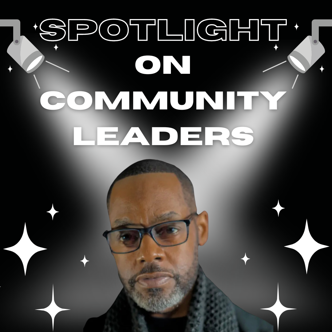 a man with glasses is being spotlighted on community leaders