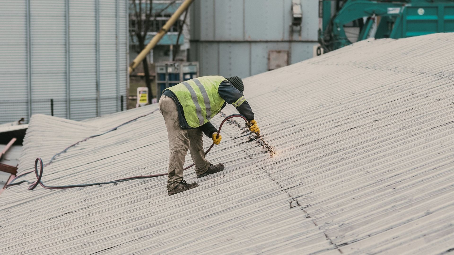 Workers repiring a roof