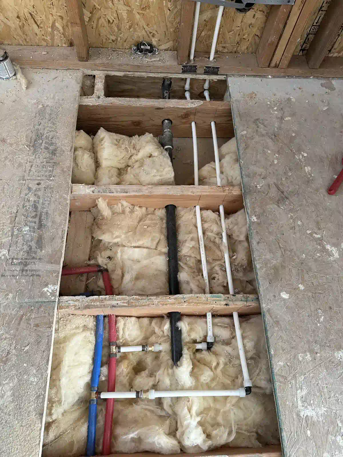 A room with a lot of pipes coming out of the floor.