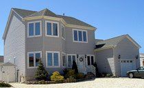 House with Car Parked in Front of The Garage Door — Ephrata, PA — Modular Home Erectors