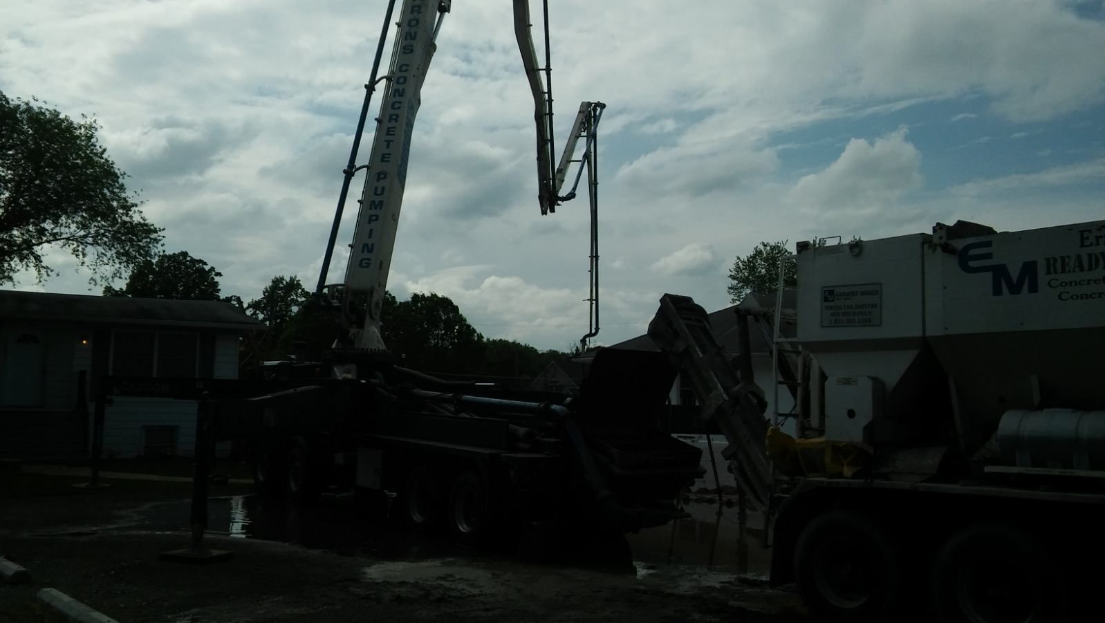 A concrete pump is being used on a construction site