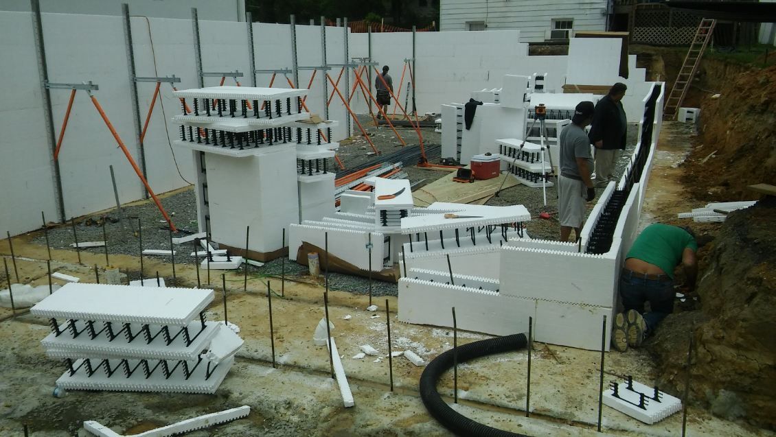 A group of people are working on a construction site.