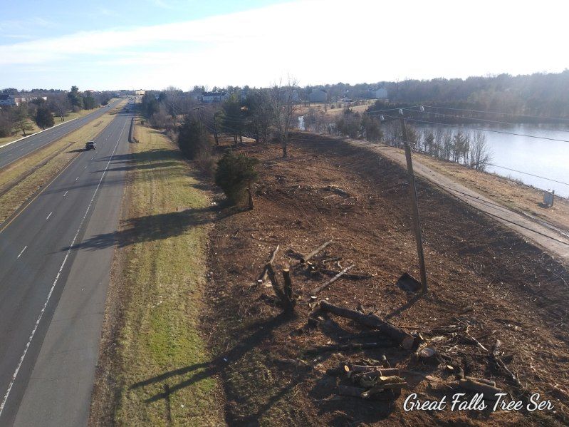 An aerial view of a highway and a river.