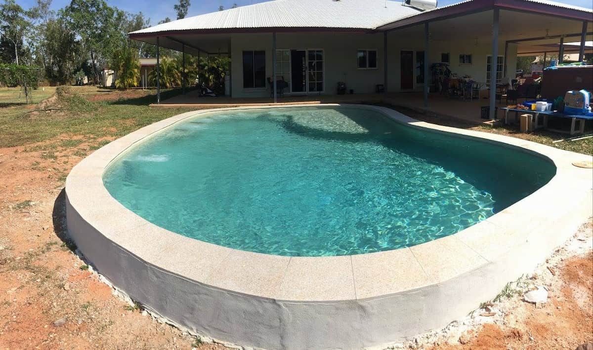Oval-shaped Swimming Pool With Turquoise Water, Surrounded by Concrete — Rod Hardy Plunge Pools in Howard Springs, NT