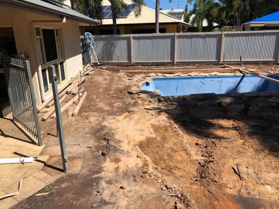 Backyard With Dirt and a Drained Blue Pool, Fenced Perimeter — Rod Hardy Plunge Pools in Howard Springs, NT