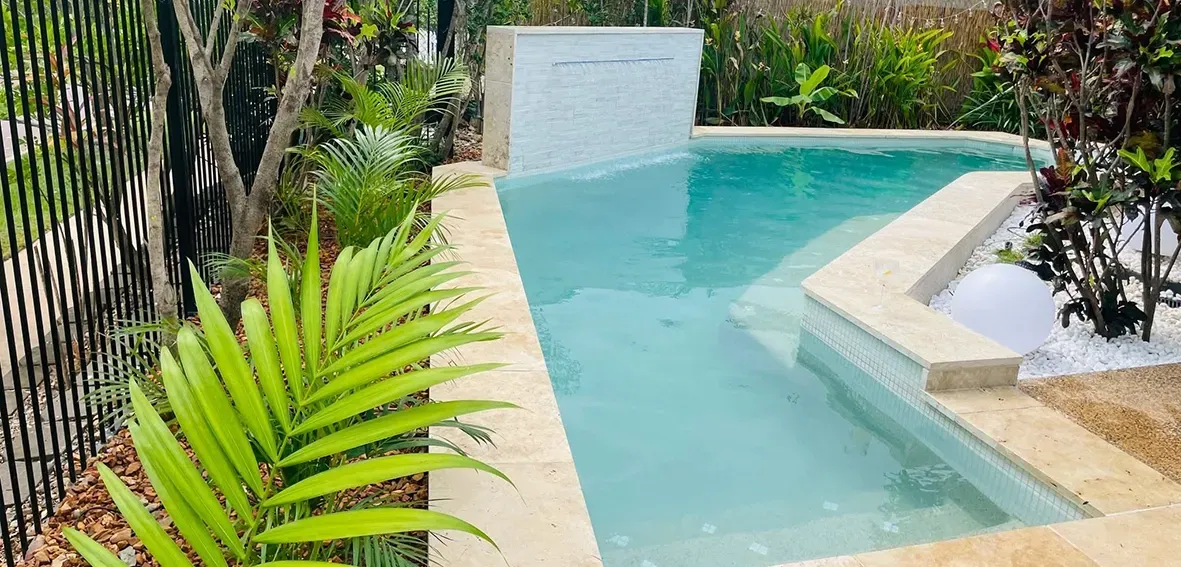 A Long Rectangular Swimming Pool With Turquoise Water, Surrounded by Tile — Rod Hardy Plunge Pools in Girraween, NT