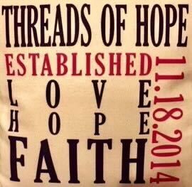 A pillow that says threads of hope established love hope faith