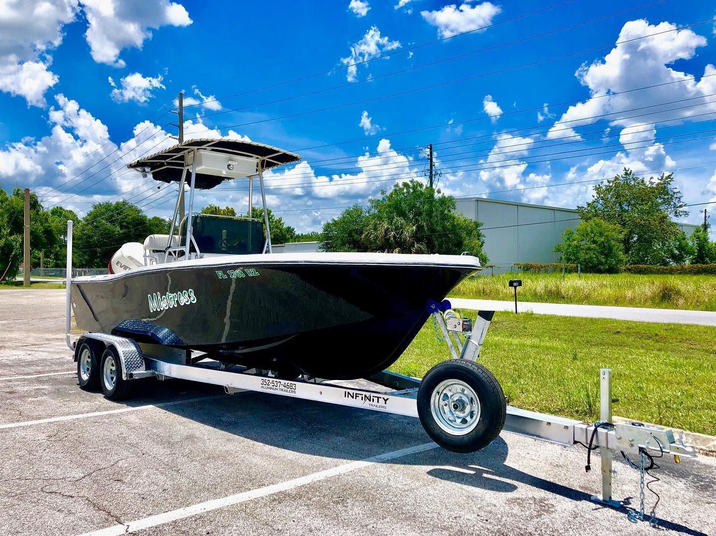 A boat on a trailer with the name geneva on the side