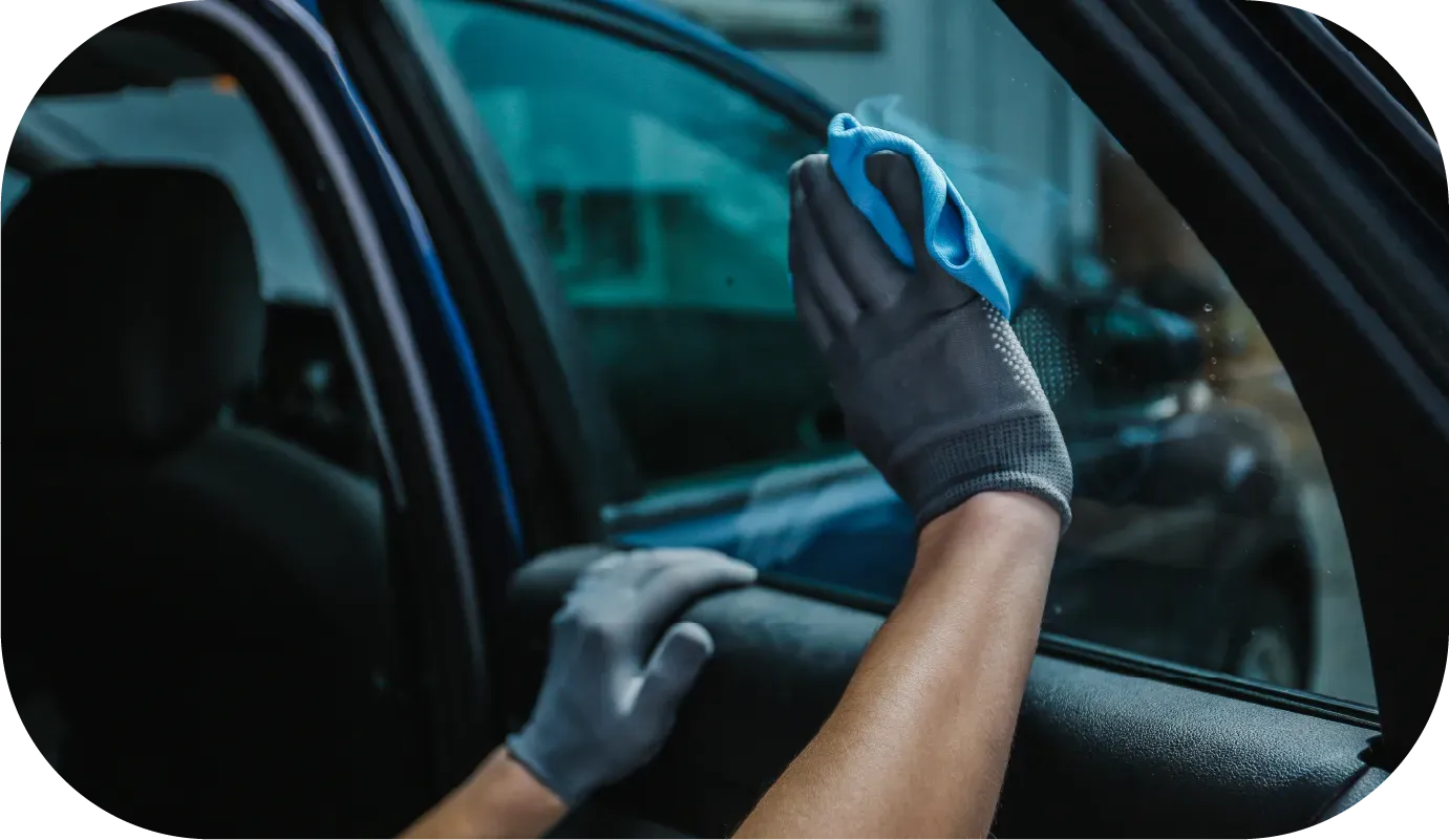 Red and black Ferrari interior; dashboard, seats, and steering wheel.