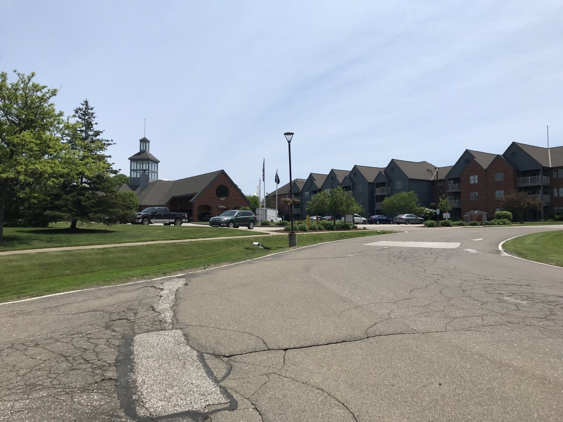 A brick building with a clock tower on top of it