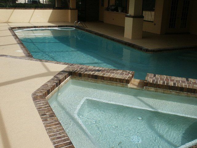 Decorative Concrete — Remodel River Rock Pool in Lakeland, FL
