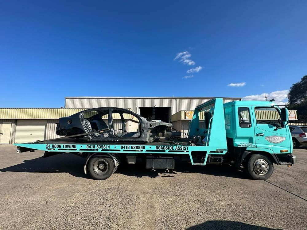 Hauled a Wrecked Car using Tow Truck — John Zelukovic Smash Repairs in Mudgee, NSW