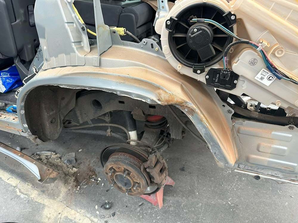 Repairing Car Wheel — John Zelukovic Smash Repairs in Mudgee, NSW