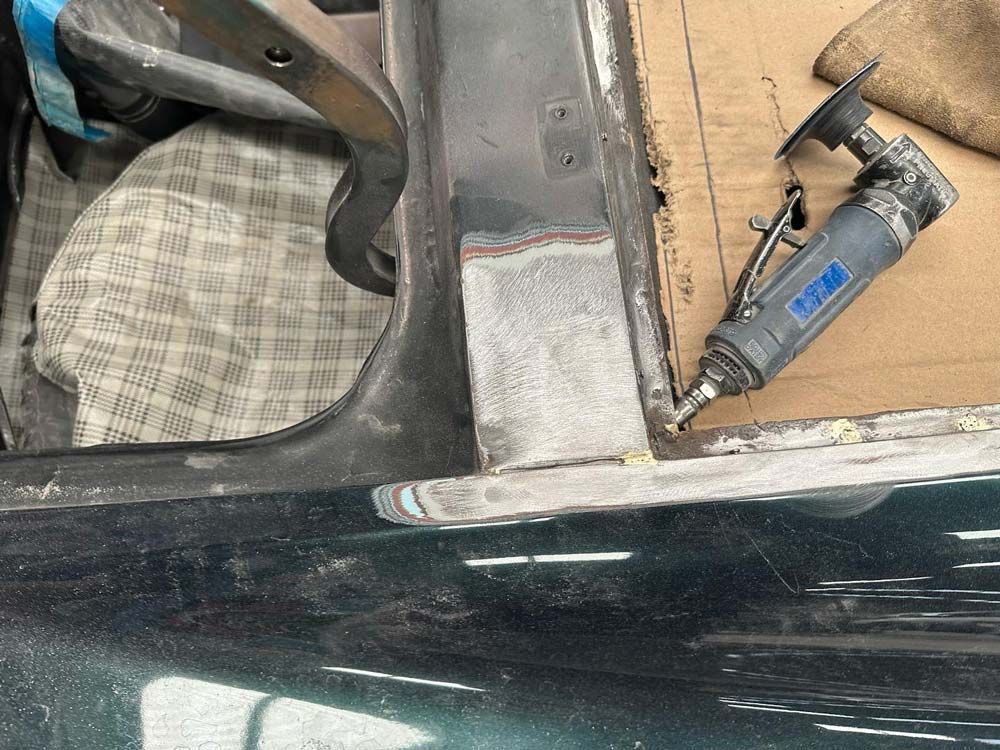 Professionals Fixing Damaged Cars — John Zelukovic Smash Repairs in Parkes, NSW