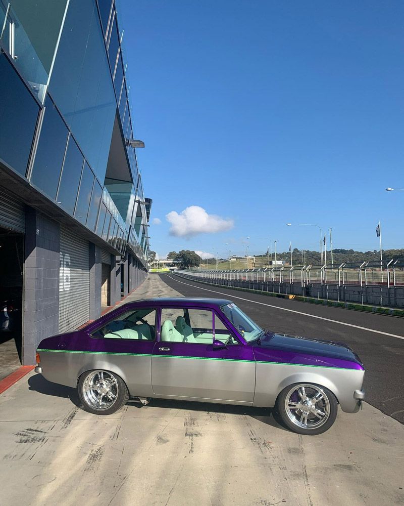 Old School Car on a Race Circuit — John Zelukovic Smash Repairs in Orange, NSW