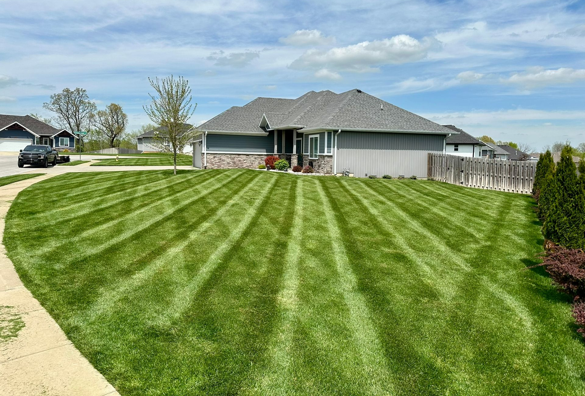 Green residential lawn | maintenance and landscaping in springfield nixa ozark mo