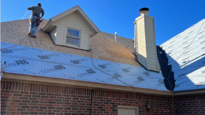 wind damaged roof shingles