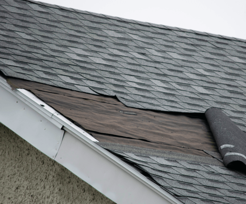 roofer replacing damaged roof