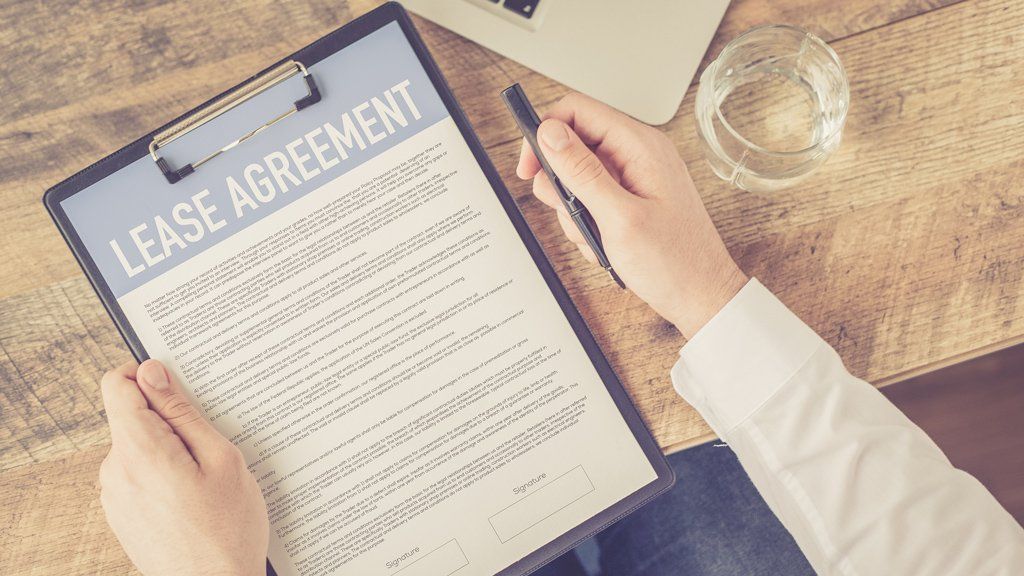 lease agreement on clipboard