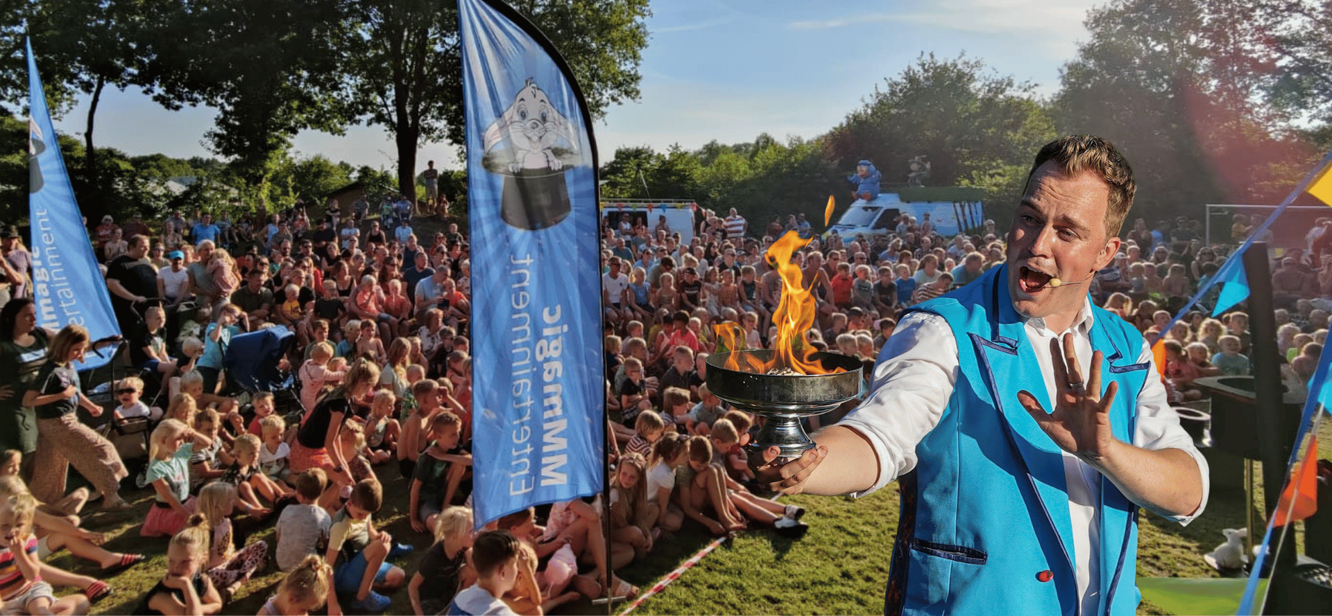 A man in a blue vest is standing in front of a crowd of people.