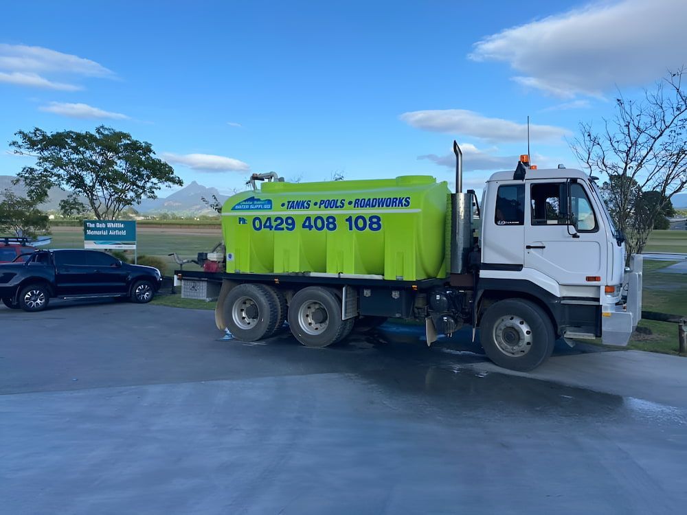 A Green and White Truck is Parked in a Parking Lot — Jaiden Tanners Water Supplies in Murwillumbah, NSW