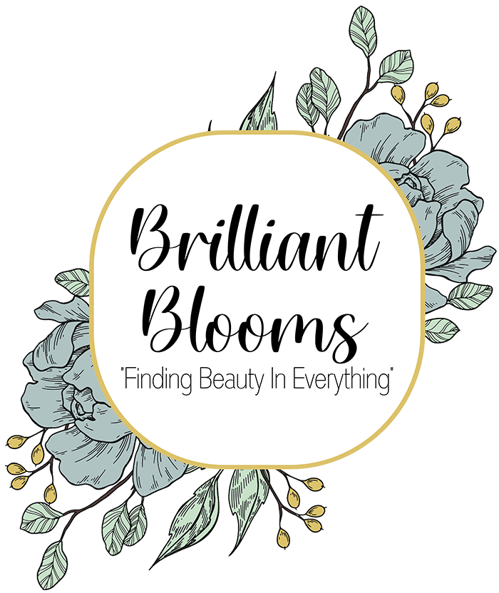 Brilliant Blooms logo with black script on a gold-outlined white oval, floral accents on either side.
