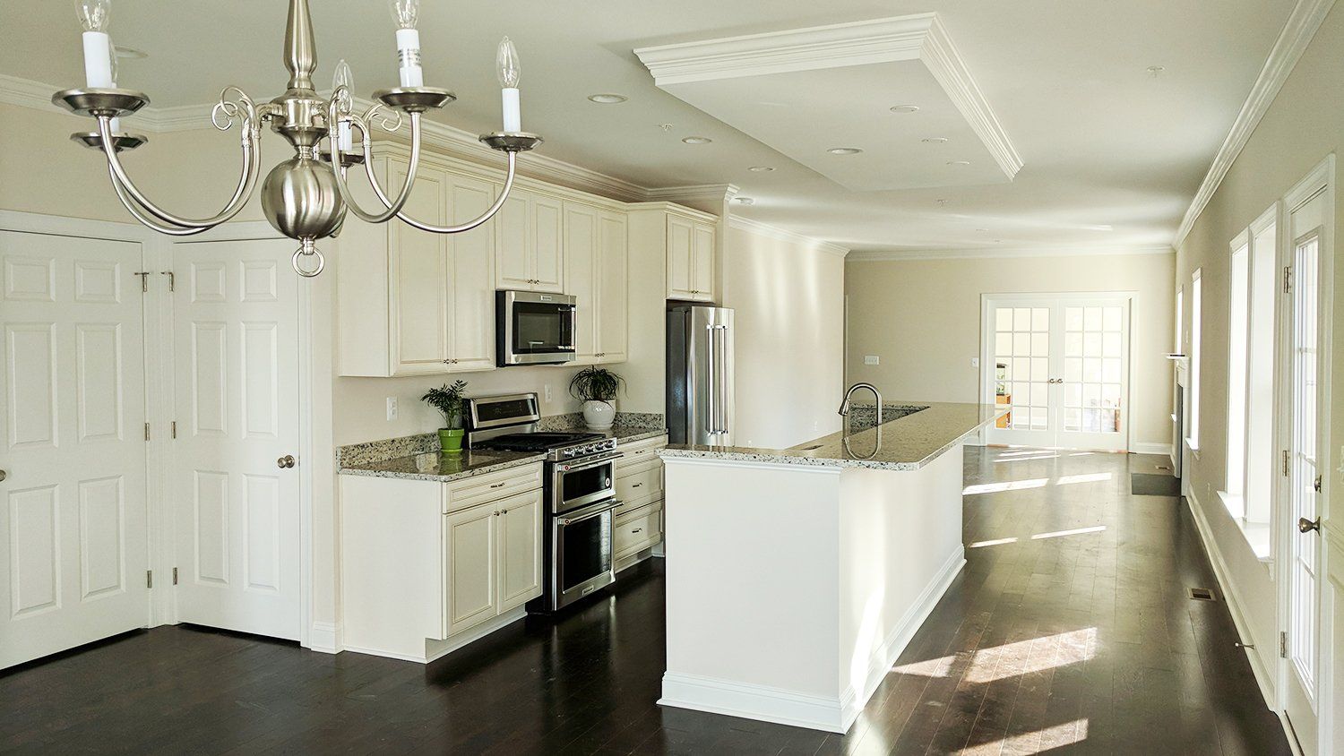 Spacious kitchen with white cabinetry and large island | Kitchens | Covell Communities | Chester, Maryland 21619