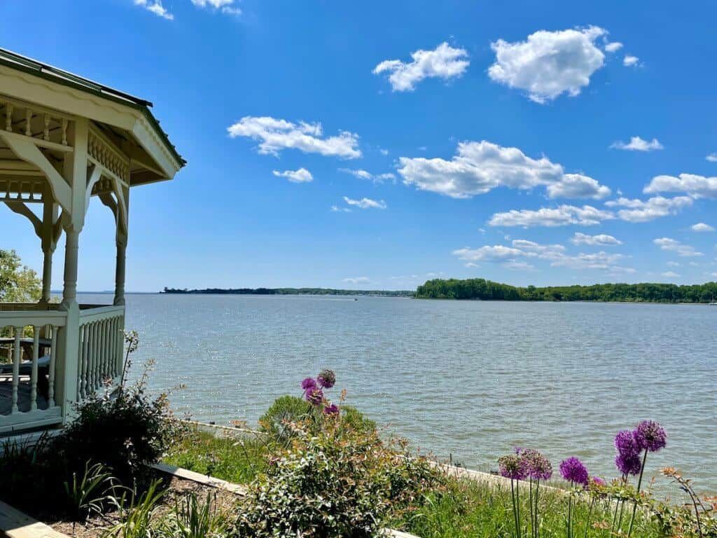 Gazebo with flowers near bay