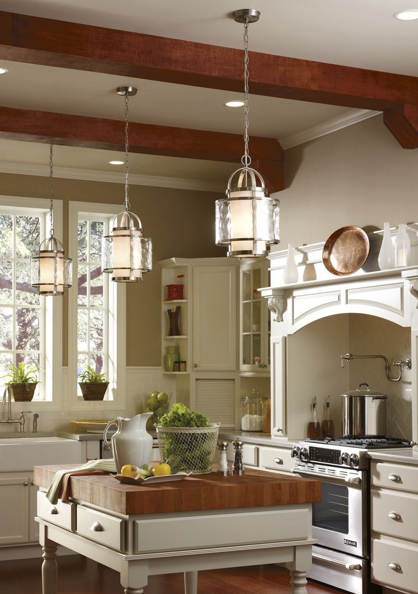 A kitchen with a large island in the middle of it