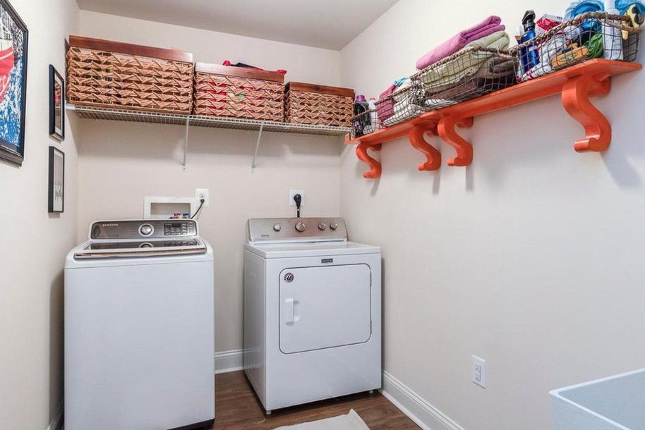 There is a washer and dryer in the laundry room.