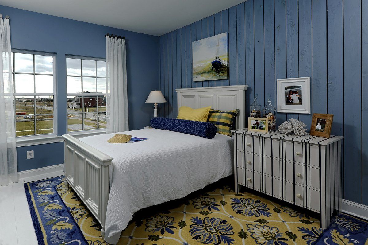 Bed and dresser in bedroom | Chantham Legacy | Covell Communities | Chester, Maryland 21619