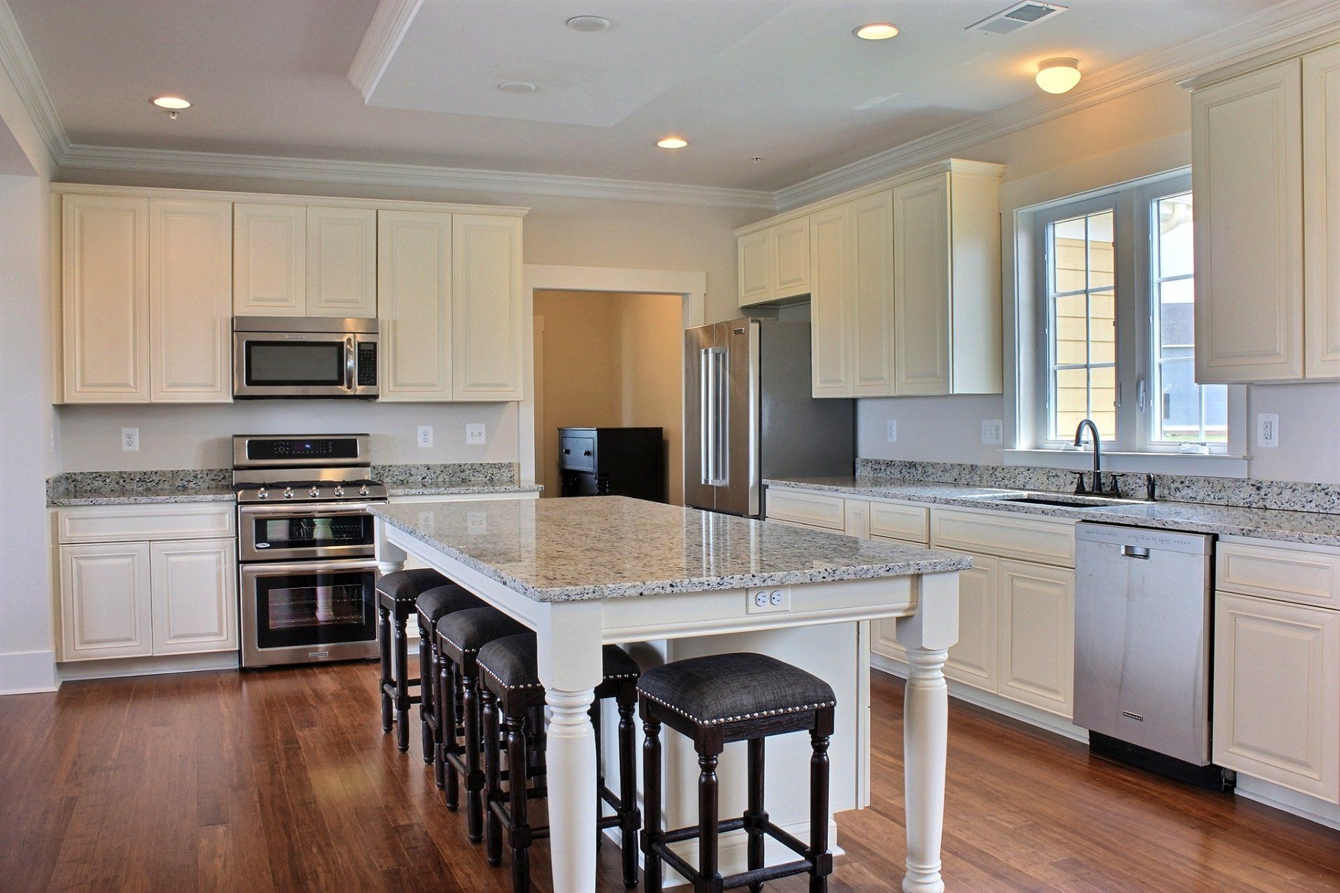 Open kitchen with large island | Harbour Town Executive | Covell Communities | Chester, Maryland 21619