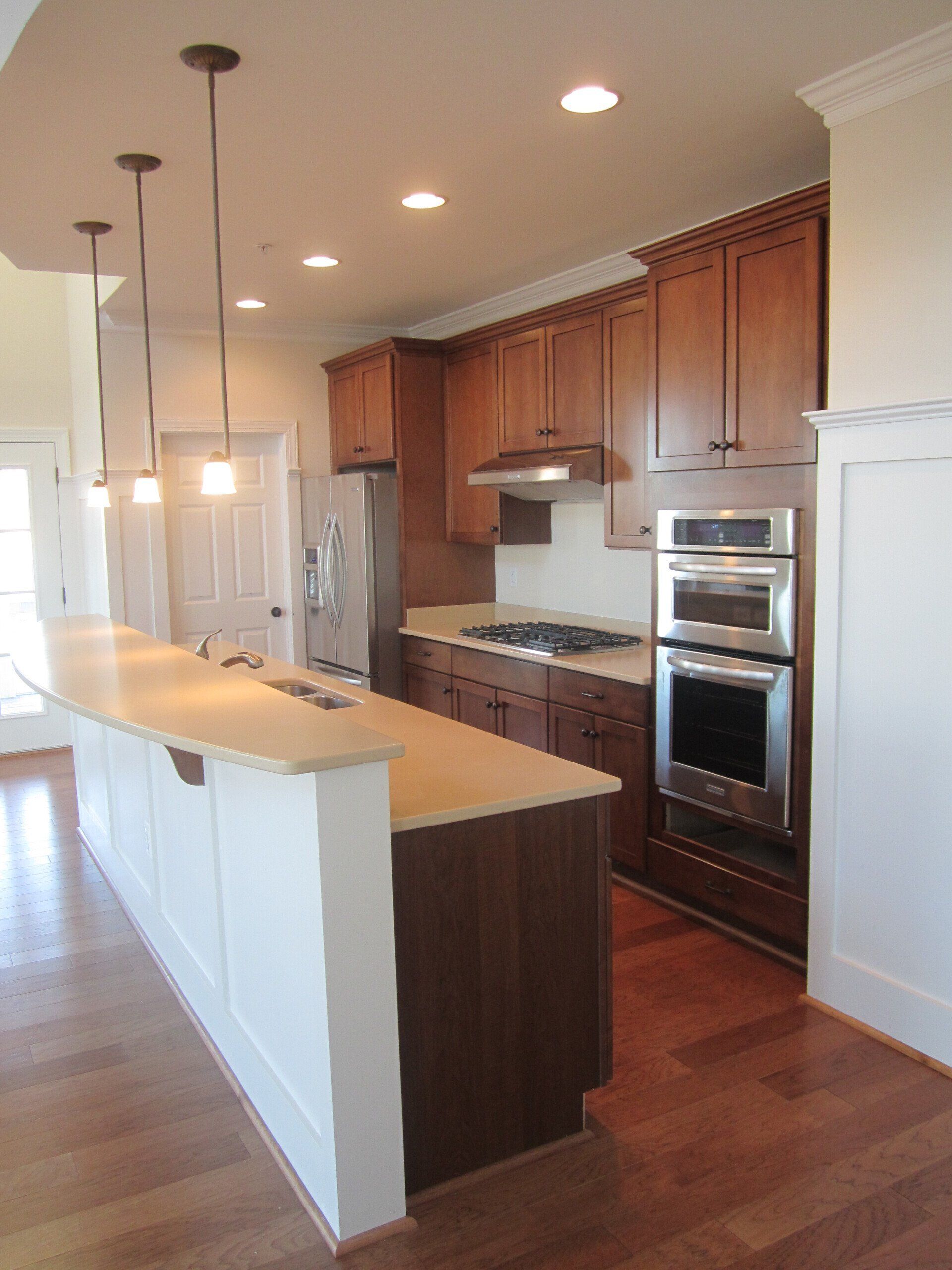 Spacious kitchen with natural cabinetry and large island | Kitchens | Covell Communities | Chester, Maryland 21619