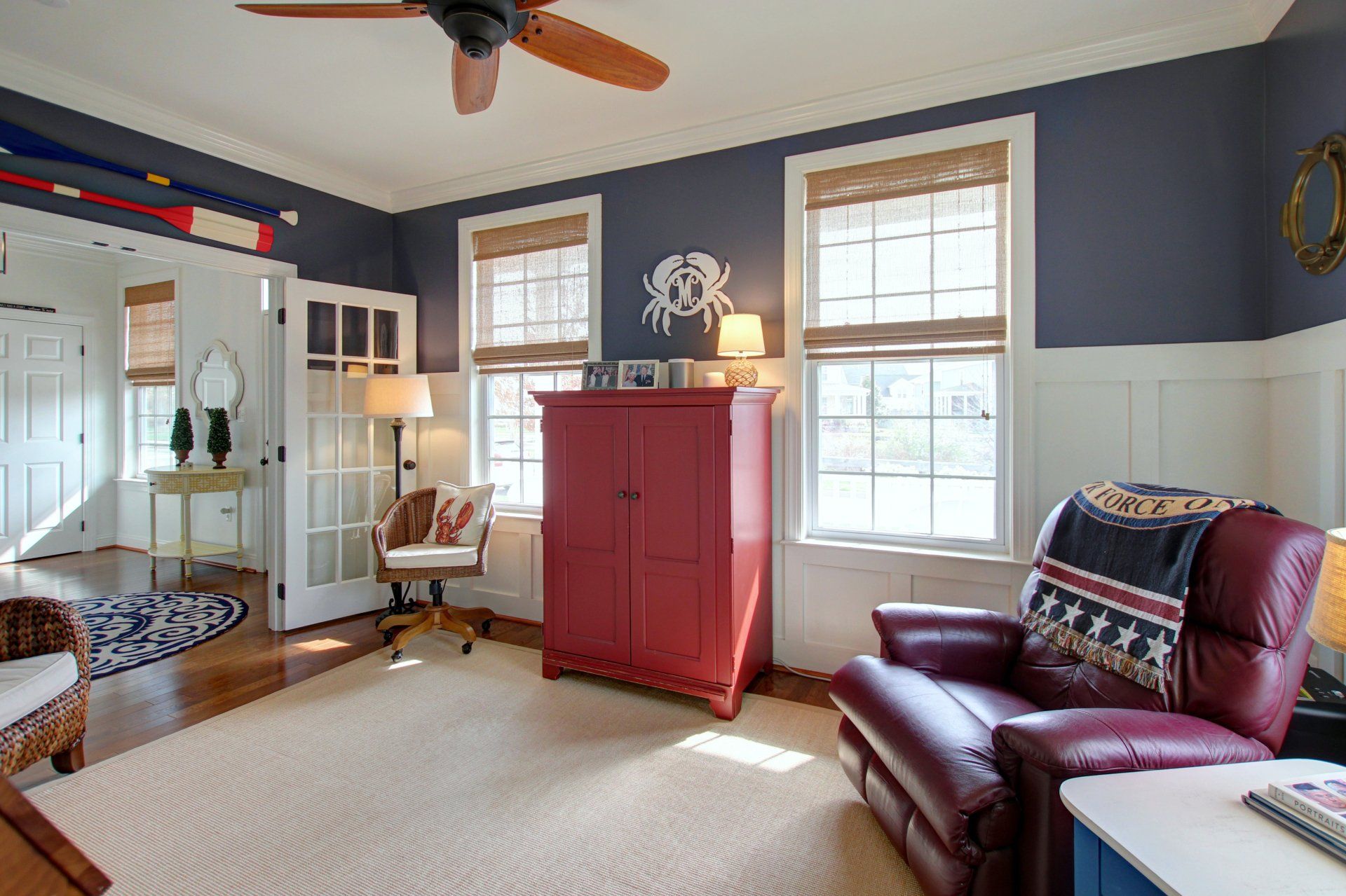 Small well lit room with red cabinet | Covell Communities | Chester, Maryland 21619