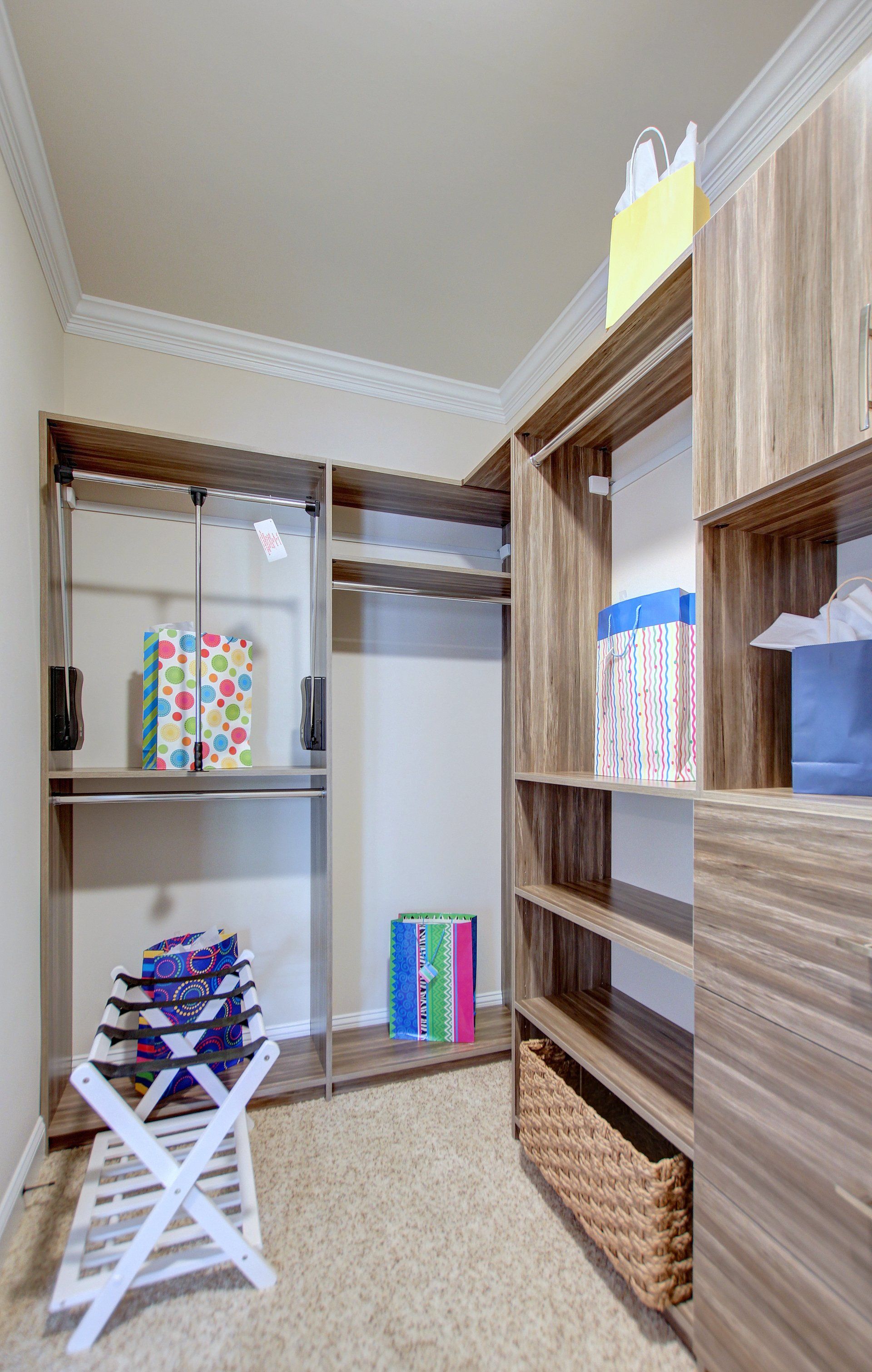 Custom shelving dressers and rods in closet | Closets | Covell Communities | Chester, Maryland 21619