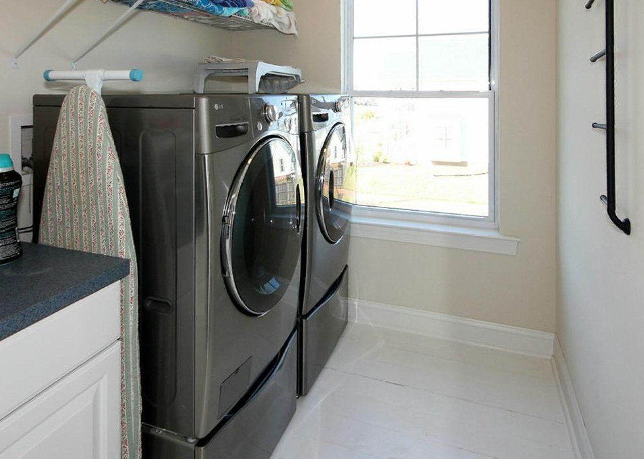 Laundry room with washer and dryer | Kitty Hawk Classic | Covell Communities | Chester, Maryland 21619