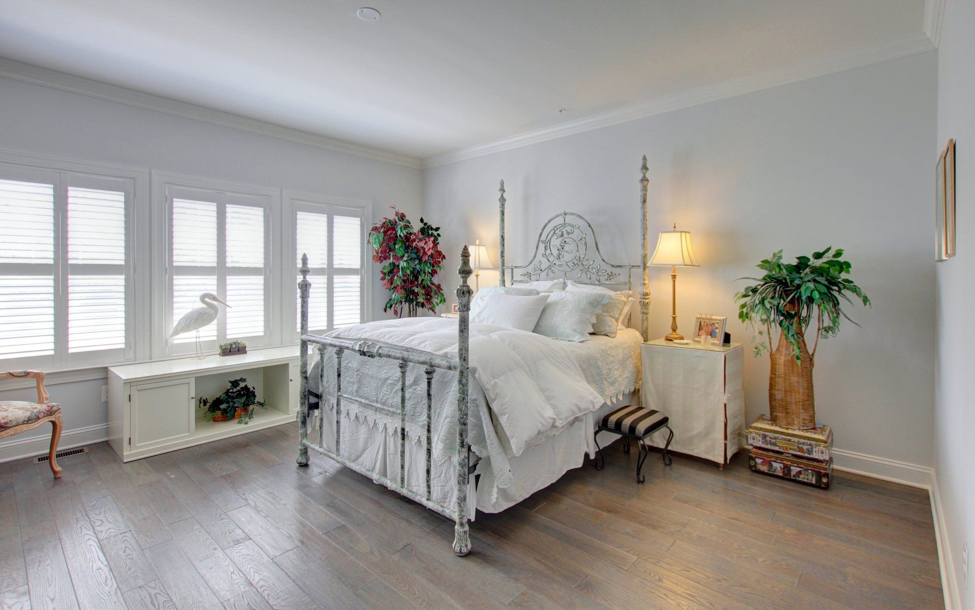 There is a large bed in the middle of the room.