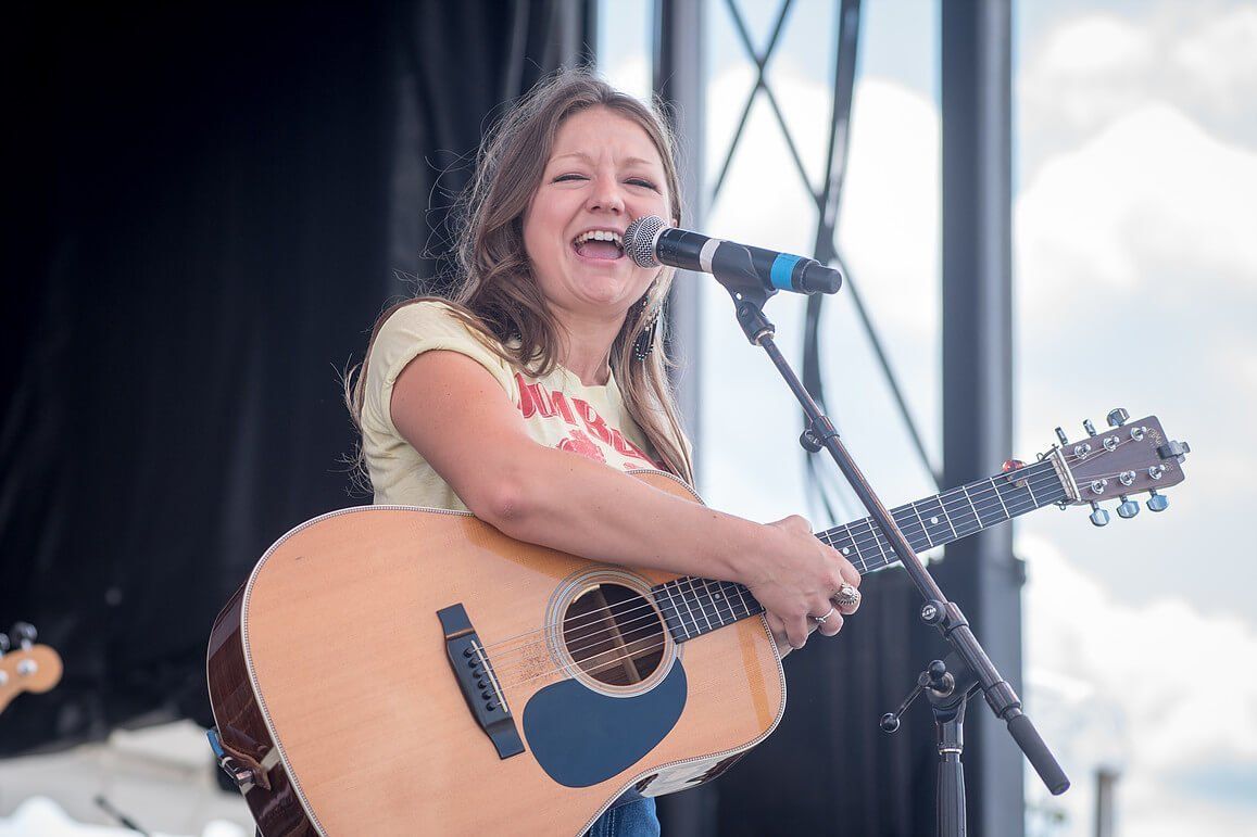 Woman playing guitar and singing | Eastern Shore Culture | Covell Communities | Chester, Maryland 21619