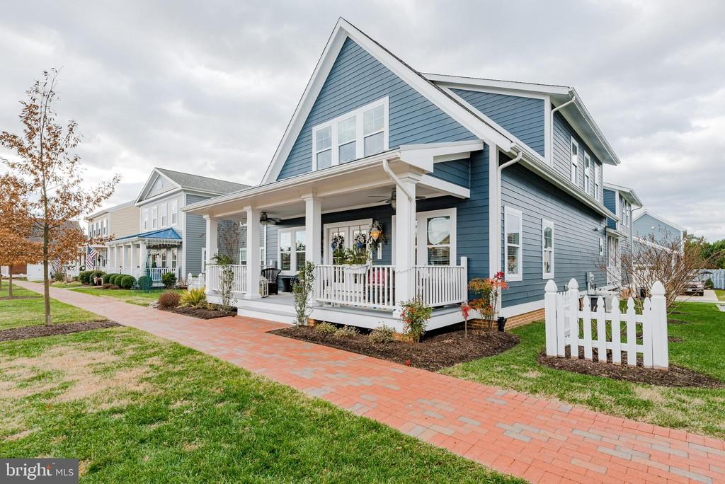 Blue home with porch exterior | Sawgrass Classic | Covell Communities | Chester, Maryland 21619