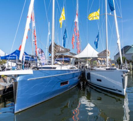 Blue sailboats with flags | Eastern Shore Culture | Covell Communities | Chester, Maryland 21619