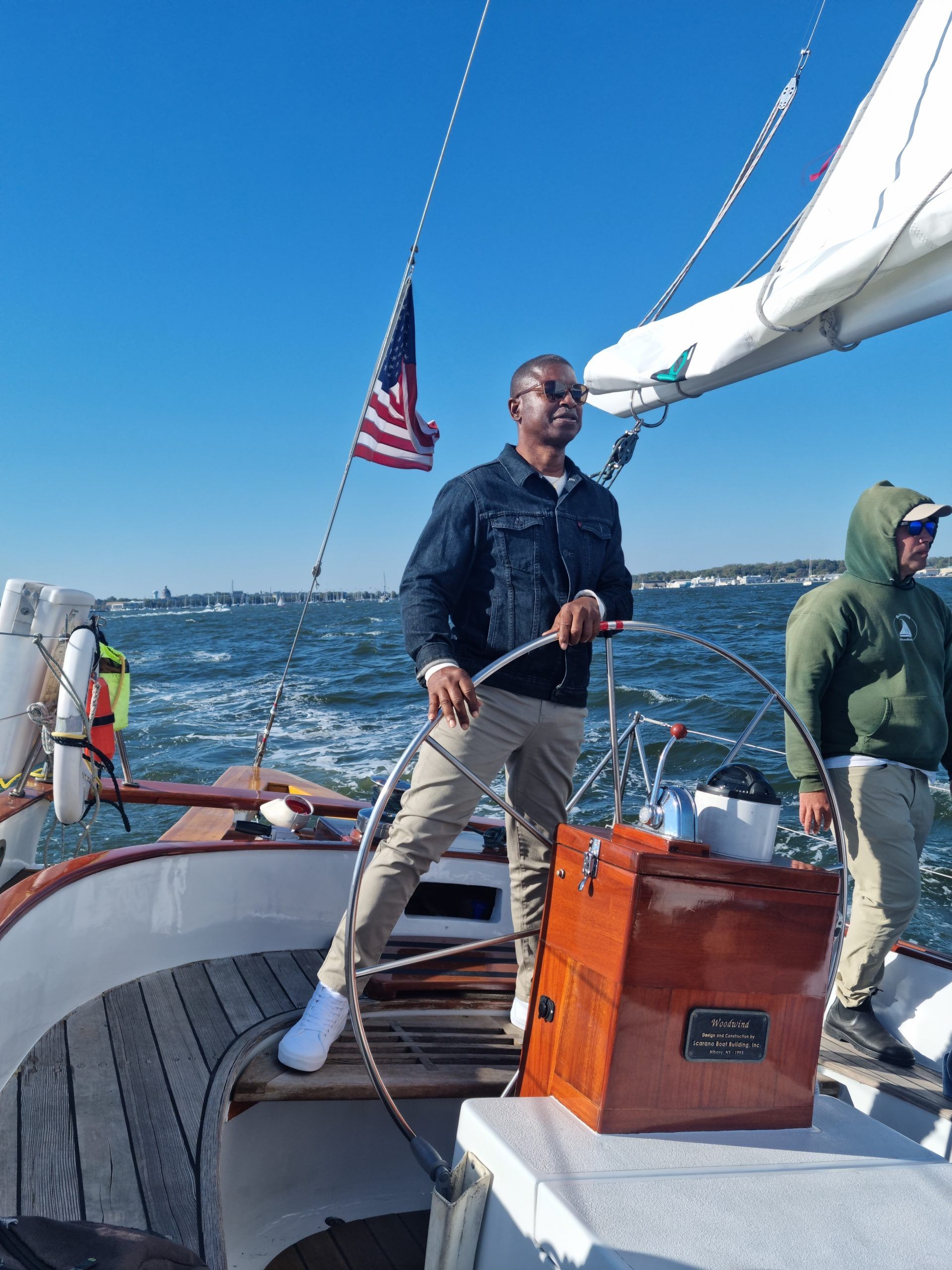 Man steering sailboat| Eastern Shore Natural Beauty | Covell Communities | Chester, Maryland 21619