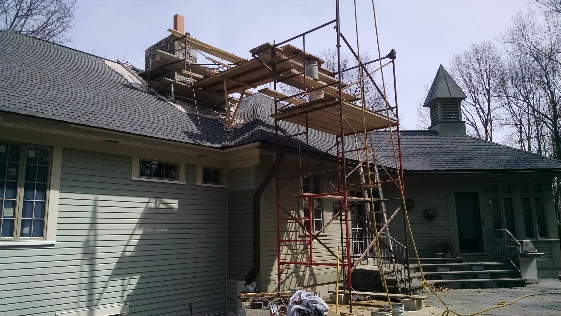 A house with scaffolding on the side of it