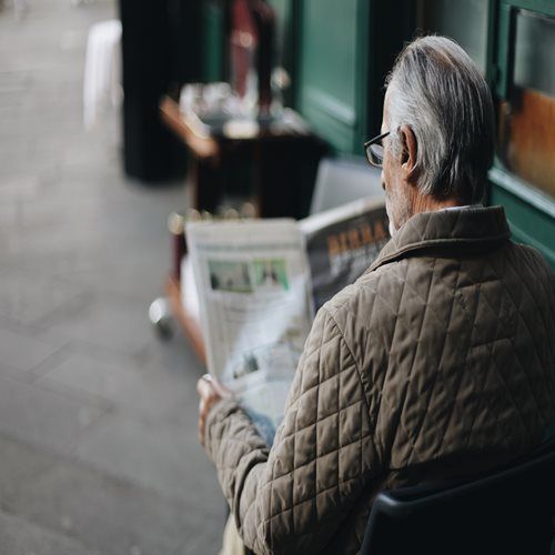 Man Reading the Newspaper