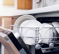 Washing Machine Repair — Dishwasher with Clean Dishes in North Clarendon, VT