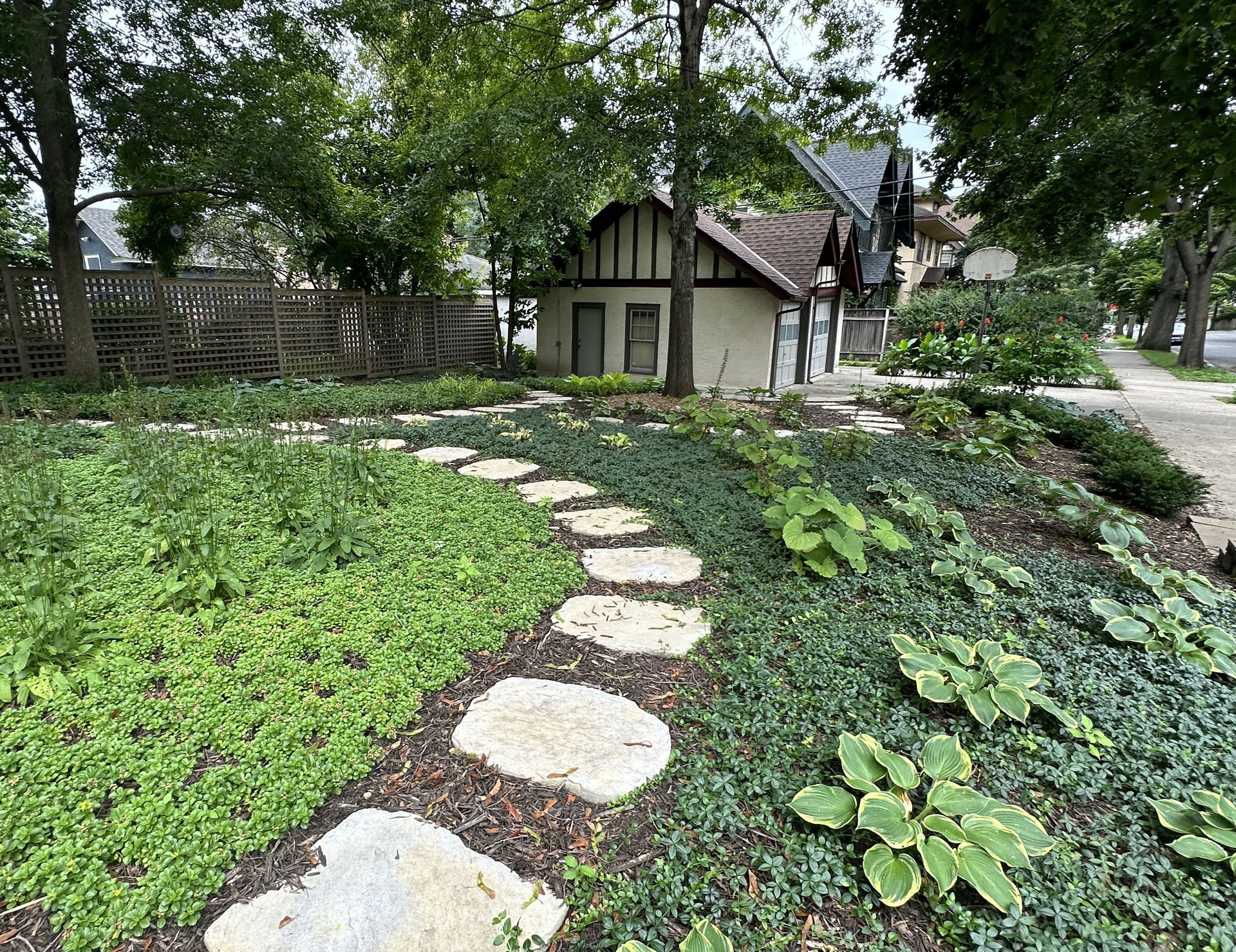 Backyard ground cover landscaping as low maintenance alternative to lawn in Minneapolis MN by KG Landscape