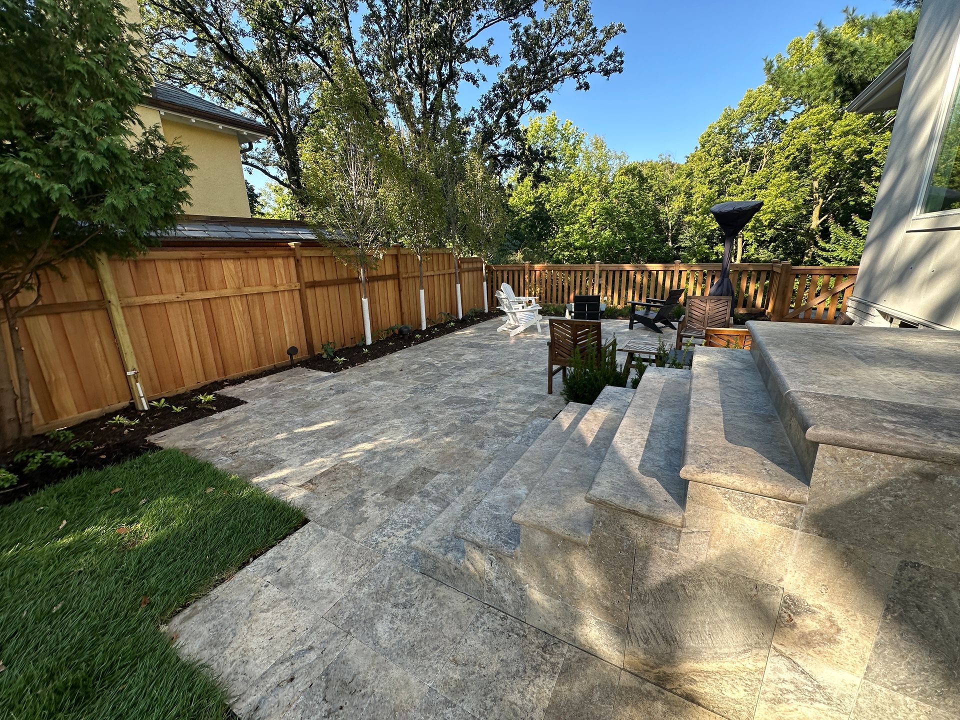 Backyard+patio+with+beautiful+natural+stone+Minneapolis+MN+KG+Landscape+Designer